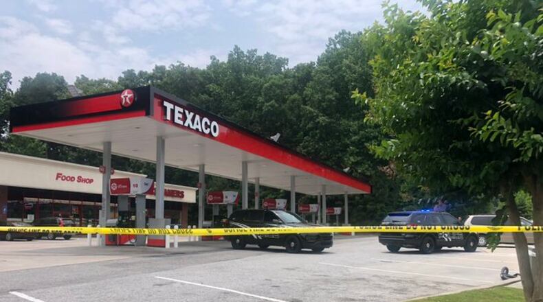 A man drove himself to this  Texaco gas station at the intersection of Oakley and Flat Shoals roads, where police say he collapsed and died. He’d been shot at a nearby apartment complex, Channel 2 Action News reported.