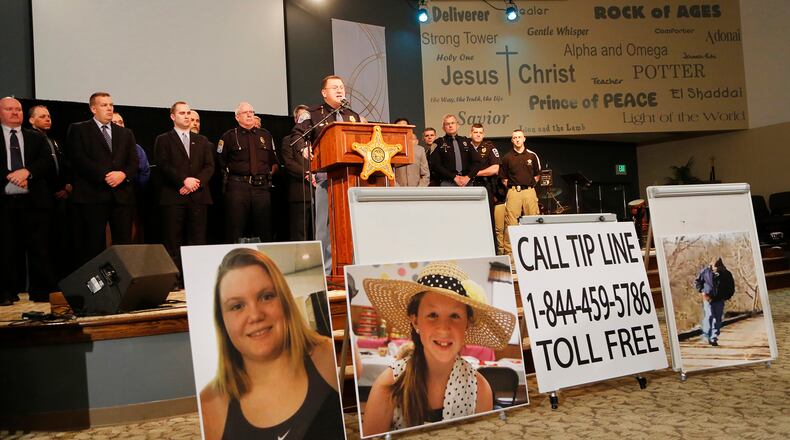 Capt. David Bursten of the Indiana State Police is joined by law enforcement officials from numerous departments to provide the latest details of the investigation into the murders of Liberty German and Abigail Williams on Wednesday, Feb. 22, 2017, at Delphi United Methodist Church in Delphi, Ind. German, 14, Williams, 13, were murdered last week while hiking the High Bridge Trail just east of Delphi. Police released an audio clip believed to be that of the girl's killer taken from Liberty German's cellphone. (John Terhune/Journal & Courier via AP)