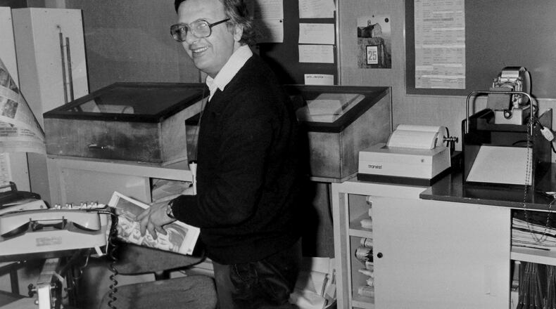 Associated Press Paris Chief Photo Editor Guy Kopelowicz at the AP office in Paris in 1984. (AP Photo/Lionel Cironneau)