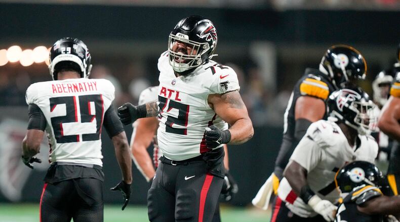 Atlanta Falcons linebacker LaCale London celebrates after a tackle against the Pittsburgh Steelers during the second half of a preseason NFL football game Thursday, Aug. 24, 2023, in Atlanta. (AP Photo/Gerald Herbert)