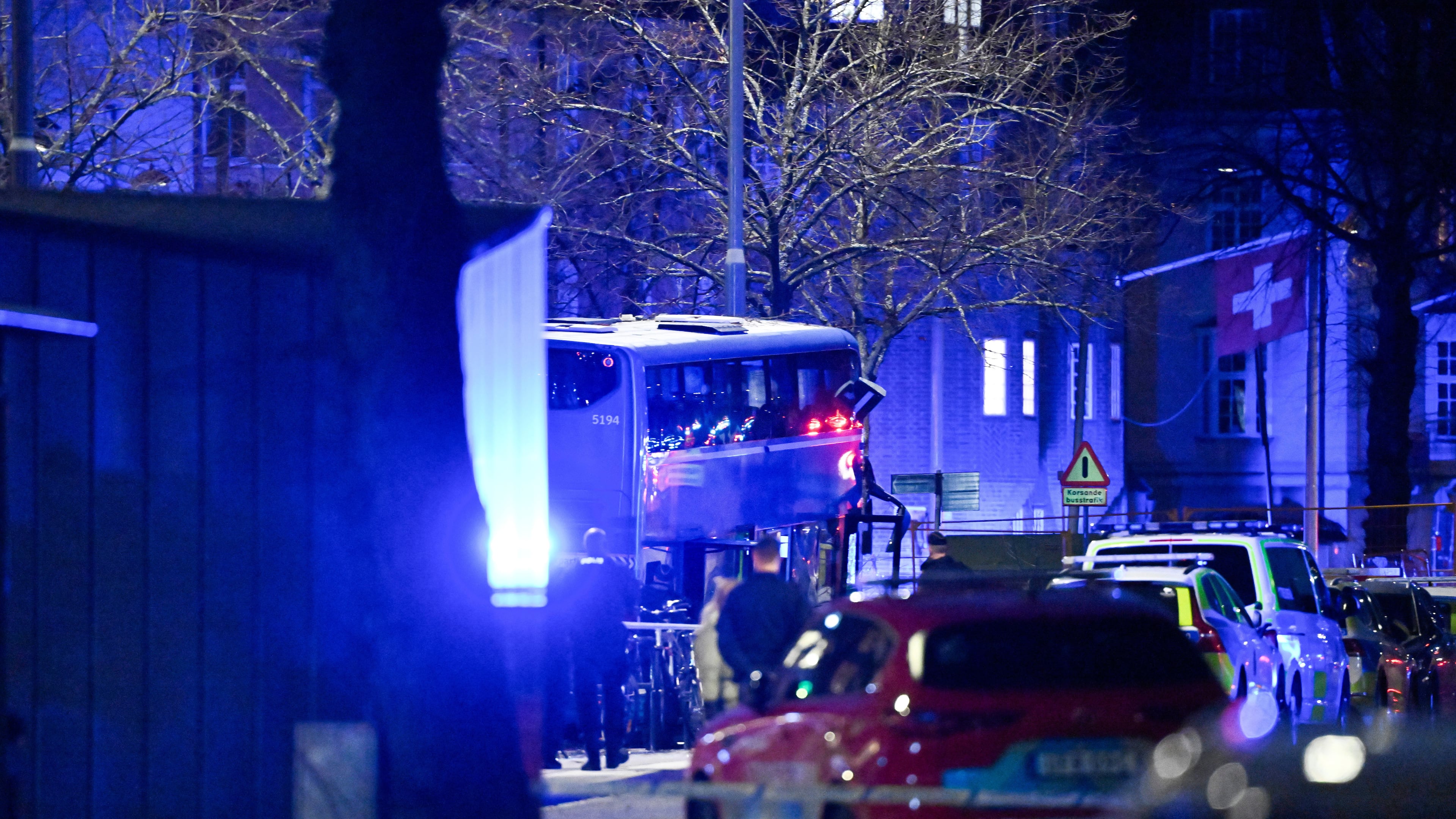 A double-decker bus crashed into a bus shelter in Stockholm on Friday, Nov. 14, 2025, causing fatalities and injuries. (Henrik Montgomery/TT News Agency via AP)