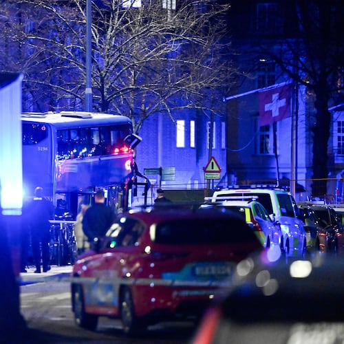 A double-decker bus crashed into a bus shelter in Stockholm on Friday, Nov. 14, 2025, causing fatalities and injuries. (Henrik Montgomery/TT News Agency via AP)