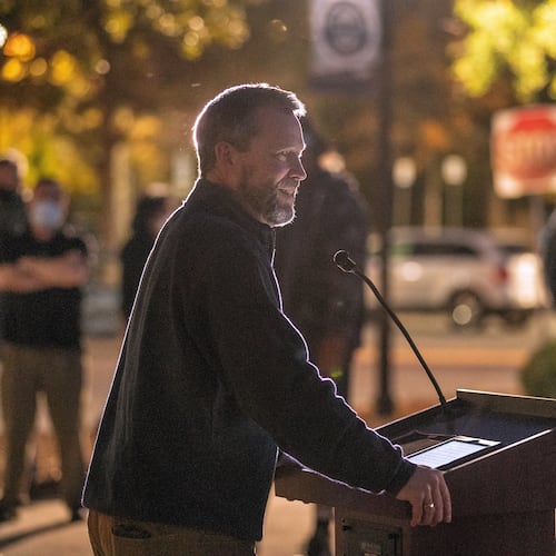 Bishop Steve Wood of St. Andrew's Church thanks health care workers at East Cooper Medical Center, where he was a patient fighting COVID-19 easier in the year, during an evening event to honor health care workers at East Cooper Medical Center Monday, Dec. 14, 2020. (Grace Beahm Alford/The Post And Courier via AP)