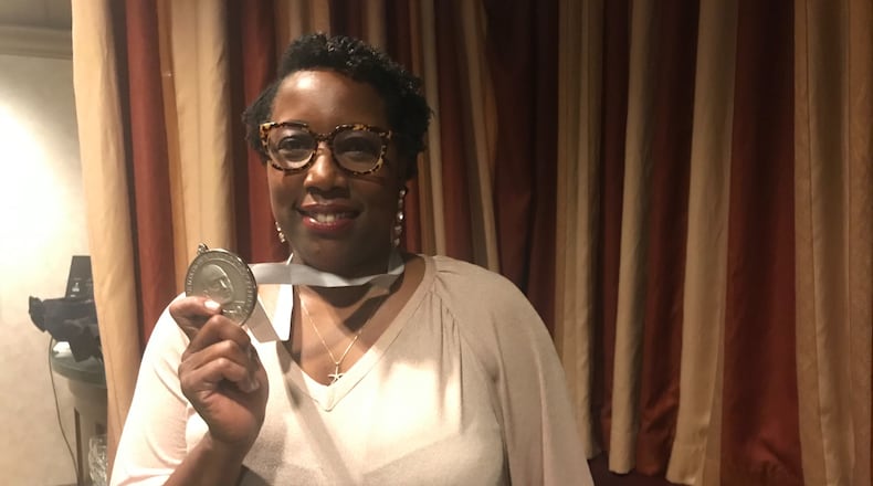 Mashama Bailey of The Grey in Savannah celebrating with her James Beard Award for Best Chef: Southeast.