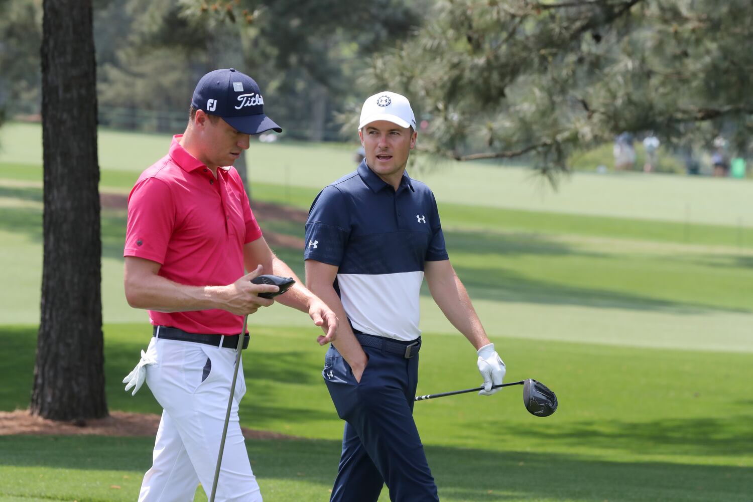 April 7, 2021, Augusta: Justin Thomas, left, and Jordan Spieth walk down the third fairway during their practice round for the Masters at Augusta National Golf Club on Wednesday, April 7, 2021, in Augusta. Curtis Compton/ccompton@ajc.com