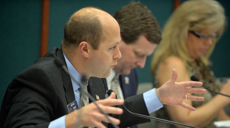 Senate Bill 395 by Hunter Hill, R-Smyrna, got locked up in a committee. Hill (front left) sought to create a state-funded private school scholarship program for the children of military personnel.