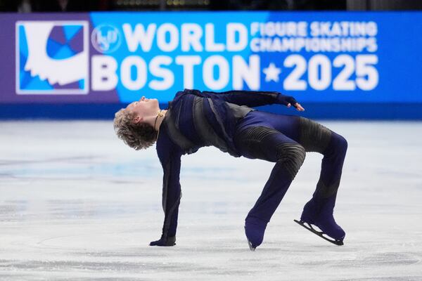 Ilia Malinin, of the United States, skates during the men's short program at the figure skating world championships, Thursday, March 27, 2025, in Boston. (AP Photo/Charles Krupa)