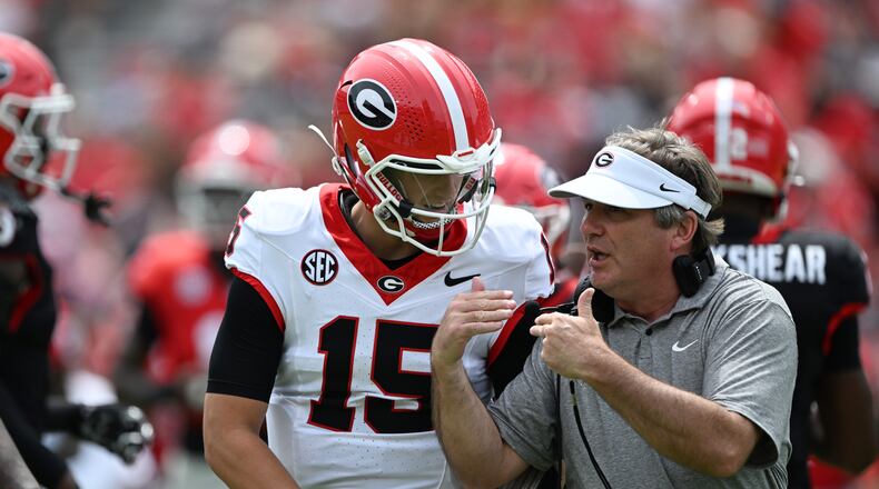 Georgia head coach Kirby Smart (right) instructs quarterback Ryan Montgomery during G-Day at Sanford Stadium on Saturday, April 18, 2026, in Athens. (Hyosub Shin/AJC)