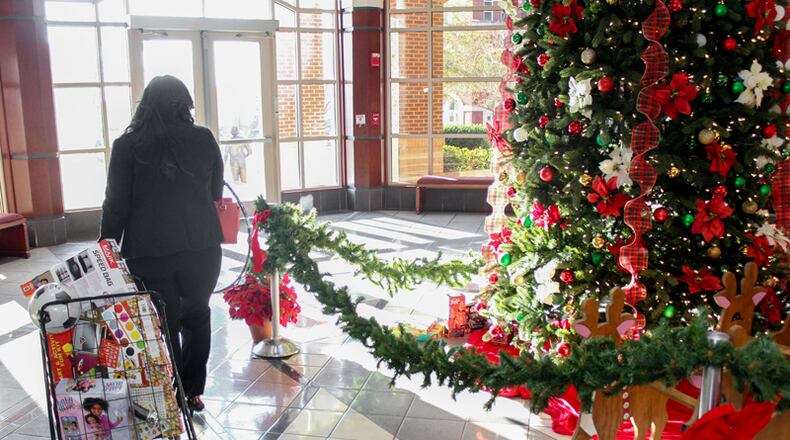 Starting in December, Forsyth County residents can leave toys for needy children under the tree at the Forsyth County Administration Building for the Aerial’s House toy drive by the Forsyth County Fire Department. FORSYTH COUNTY