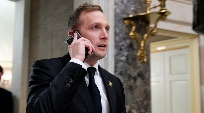 FILE - Rep. Max Miller, R-Ohio, walks out of a meeting with House Majority Leader Steve Scalise of La., on Capitol Hill, Oct. 11, 2023, in Washington. (AP Photo/Andrew Harnik, File)