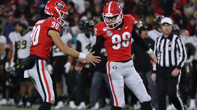 Georgia punter Jake Camarda (L) is ready, willing and able to replace kicker Rodrigo Blankenship (98) as not only the Bulldogs' place-kicker, but also as that quirky Bulldog that fans just love to root for. (Curtis Compton/ccompton@ajc.com)