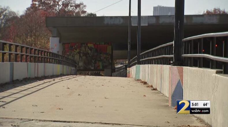 Atlanta police are investigating after a woman said she was groped and robbed by a man she smiled at on a popular walking trail.