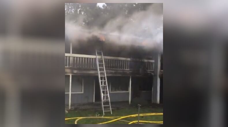 Twelve units were damaged in the Friday fire.