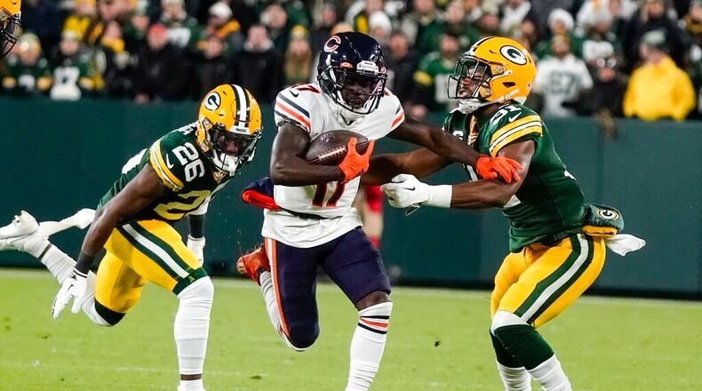 Chicago Bears' Jakeem Grant gets past Green Bay Packers' Darnell Savage and Adrian Amos for a touchdown reception during the first half of an NFL football game Sunday, Dec. 12, 2021, in Green Bay, Wis. W (AP Photo/Morry Gash, File)