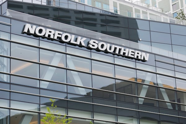 The Norfolk Southern logo is prominently displayed on the company's headquarters in Atlanta. The merger with Union Pacific means the headquarters be in Omaha, where Union Pacific is based. (Miguel Martinez/AJC 2023)