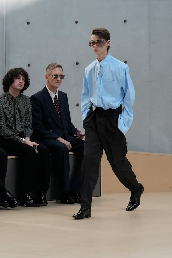 A model wears a creation as part of the men's Saint Laurent Spring-Summer 2026 collection, that was presented in Paris, Tuesday, June 24, 2025. (AP Photo/Michel Euler)