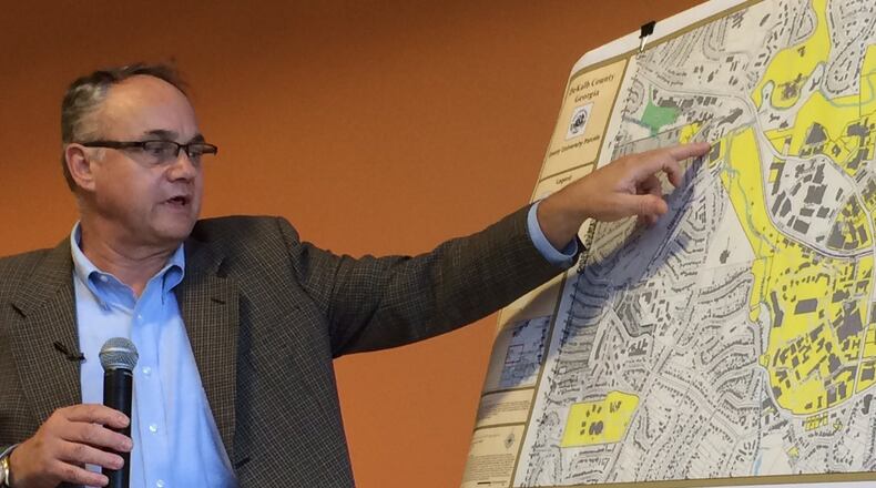 DeKalb County Commissioner Jeff Rader outlines what he knows about Emory University’s move to annex into Atlanta. Photo by Bill Torpy
