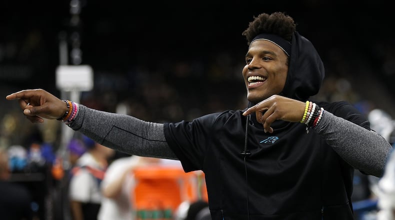 Cam Newton #1 of the Carolina Panthers talks with fans during the game against the New Orleans Saints during the first half at the Mercedes-Benz Superdome on December 30, 2018 in New Orleans, Louisiana. (Photo by Chris Graythen/Getty Images)