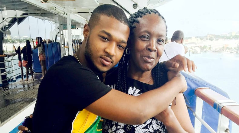 Linda Falayi, shown on a 2015 trip to the Bahamas with her grandson, died Monday night when she was hit by a car in DeKalb County.