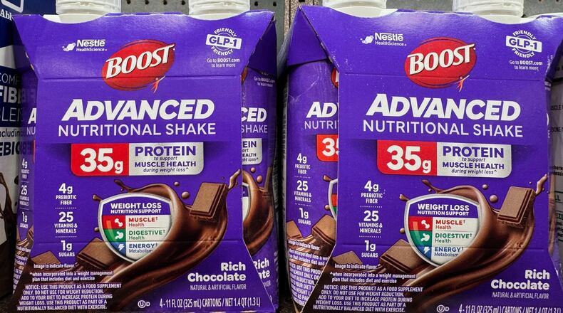 Nutritional shakes with "GLP-1 Friendly" labels sit on the shelf of a Kroger grocery store Tuesday, Jan. 13, 2026, in Ann Arbor, Mich. (AP Photo/Dee-Ann Durbin)