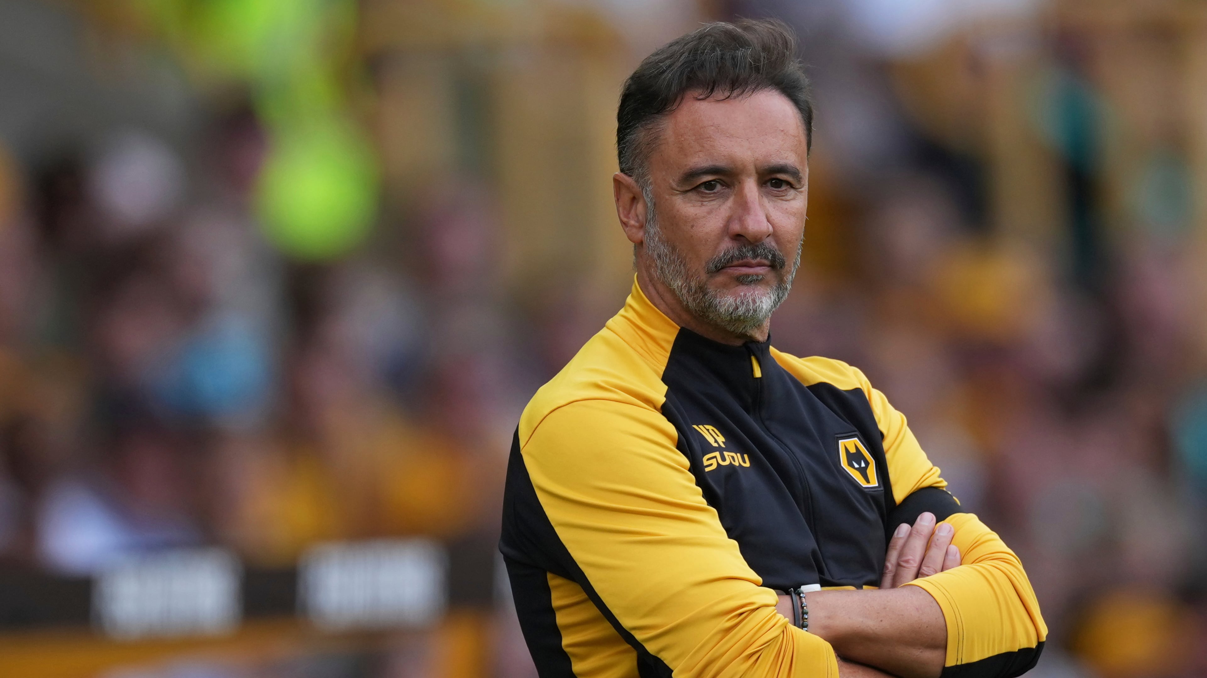 FILE - Wolverhampton Wanderers' head coach Vitor Pereira concentrates during the English Premier League soccer match between Wolverhampton Wanderers and Manchester City at Molineux Stadium, Wolverhampton, England, Saturday, Aug. 16, 2025. (AP Photo/Dave Shopland, file)