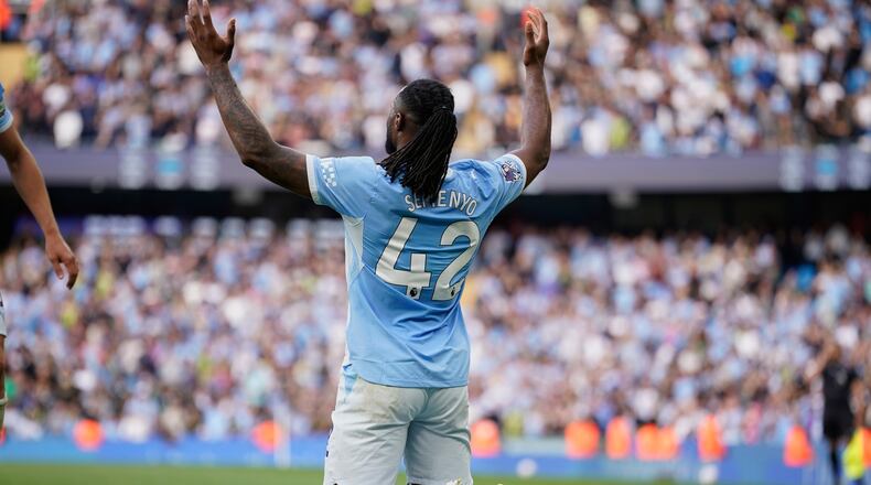 Manchester City's Antoine Semenyo reacts after scoring third goal during the English Premier League soccer match between Manchester City and Sunderland in Manchester, England, Sunday, Sept. 20, 2026. (AP Photo/Dave Thompson)