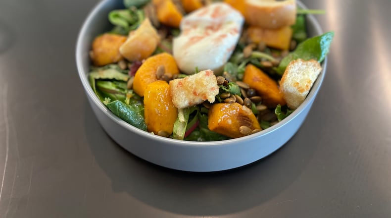 You can get persimmon and burrata salad at Ganji, located inside Minhwa Spirits in Doraville. (Angela Hansberger for The Atlanta Journal-Constitution)