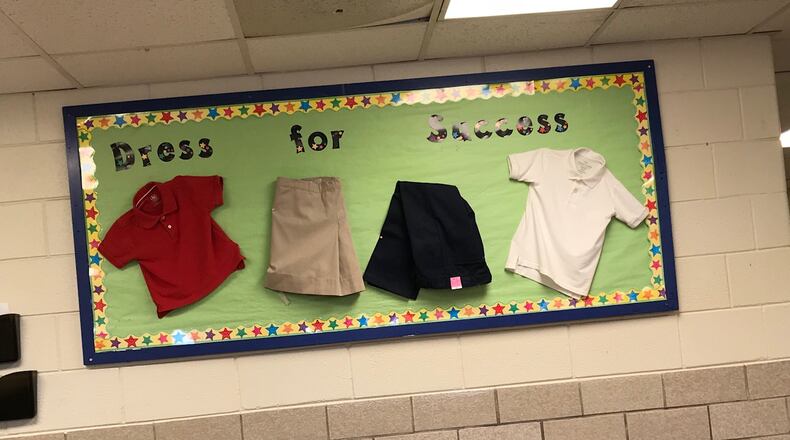 A garbage can was used to collect water from a leaking air conditioning unit at Dresden Elementary School in Atlanta during the first week of the school year. A leak has been reported in the same area each of the past three years. HANDOUT PHOTO