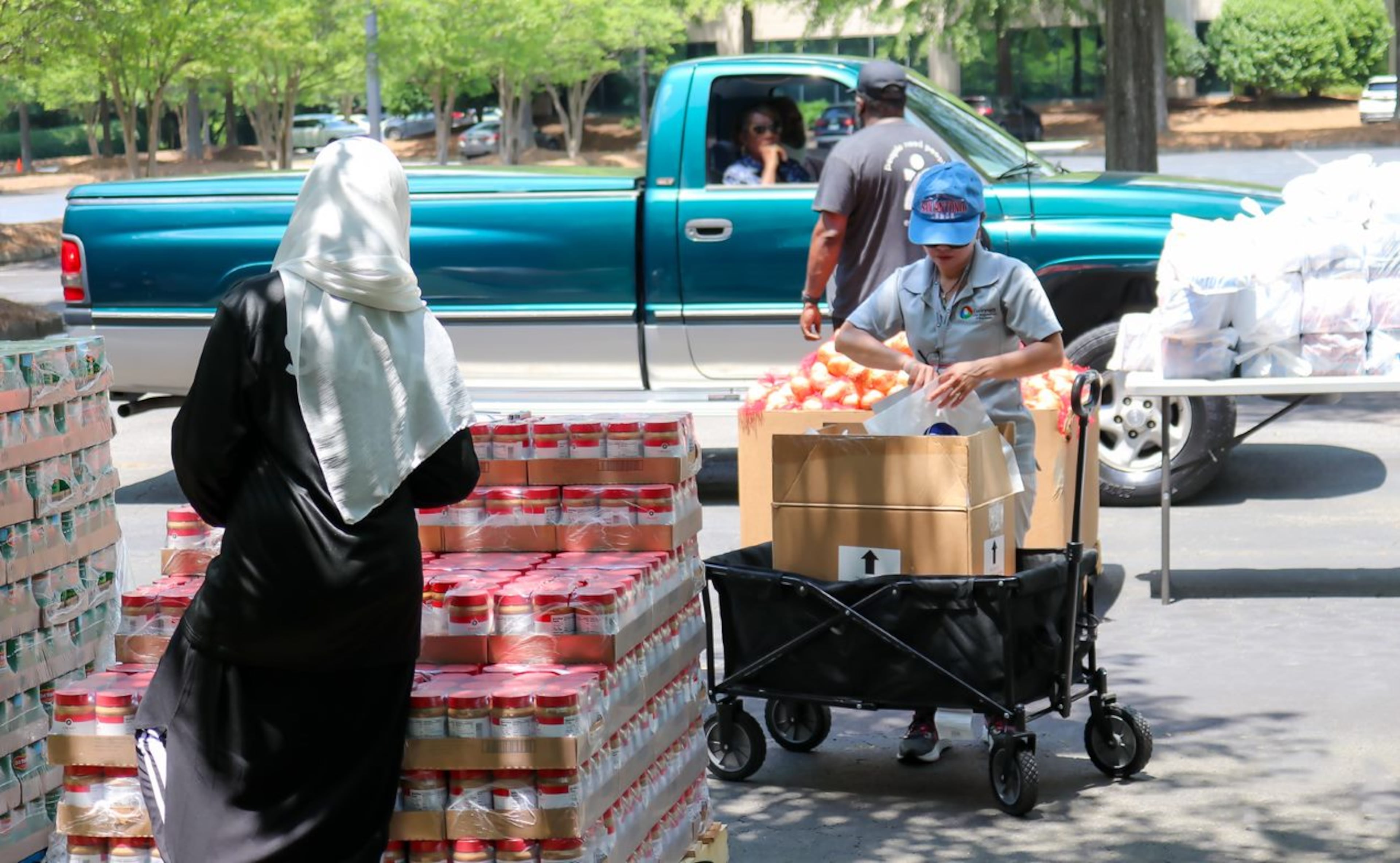 Volunteers prepare to load food from the Atlanta Food Bank during Volunteer Gwinnett's Mobile Food Distribution program. (Courtesy Gwinnett County)