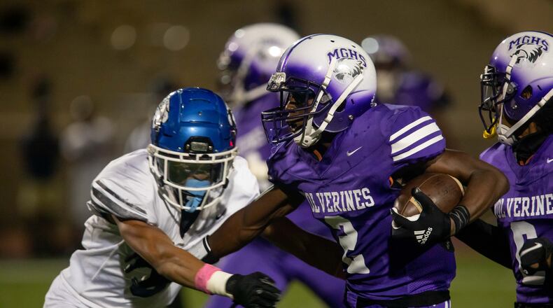 Miller Grove's Cayman Spalding (2) carries the ball during a GHSA high school football game between Stephenson High School and Miller Grove High School at James R. Hallford Stadium in Clarkston, GA., on Friday, Oct. 8, 2021. (Photo/Jenn Finch)