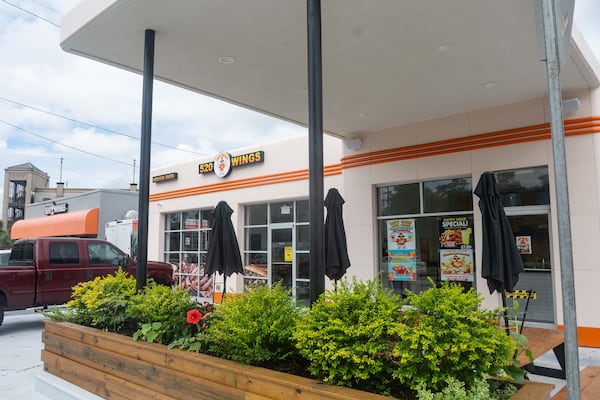 The exterior of 520 Wings in a renovated gas station in Savannah