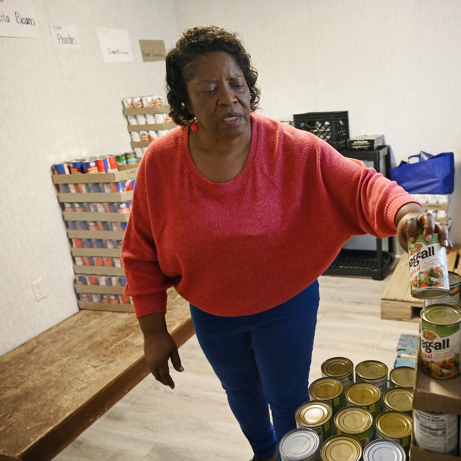 Gloria Simmons, food pantry manager at Hancock Helping Hands, shows the inventory on Tuesday, October 7, 2025. (Hyosub Shin/AJC)