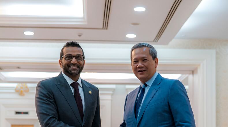 In this photo provided by Agence Kampuchea Press (AKP), U.S. FBI director Kash Patel, left, meets Cambodian Prime Minister Hun Manat at his offices in Phnom Penh, Cambodia on Thursday, July 22, 2026. (AKP via AP)