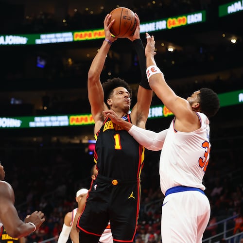 Atlanta Hawks forward Jalen Johnson looks to shoot against New York Knicks center Karl-Anthony Towns, right, during the first half of an NBA basketball game, Monday, April 6, 2026, in Atlanta. (Colin Hubbard/AP)
