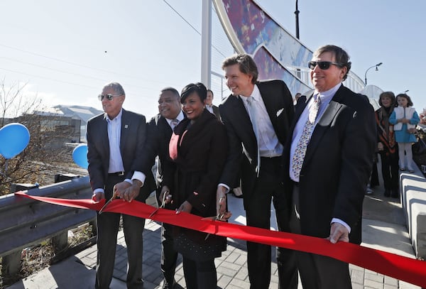 Ed McBrayer (from left), then executive director of the PATH Foundation, City Councilmember Michael Julian Bond, then-Atlanta Mayor Keisha Lance Bottoms, Beau Allen and then-Cox Enterprises Chairman Jim Kennedy dedicate the Ivan Allen Gateway in downtown Atlanta in 2019. (Bob Andres/AJC)