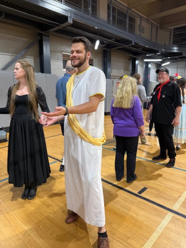 Jeremy Peterson (center, with Mari Leivan, left) is on the board of Atlanta Contra Dance, part of a youth movement for the organization celebrating its golden anniversary. (Courtesy of Kembi Hagen)