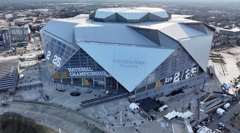 Aerial photo shows the Mercedes-Benz Stadium decorated with College Football Championship logos ahead of the 2025 College Football National Championship between Notre Dame and Ohio State, Friday, January 17, 2025, in Atlanta. (Hyosub Shin / AJC)