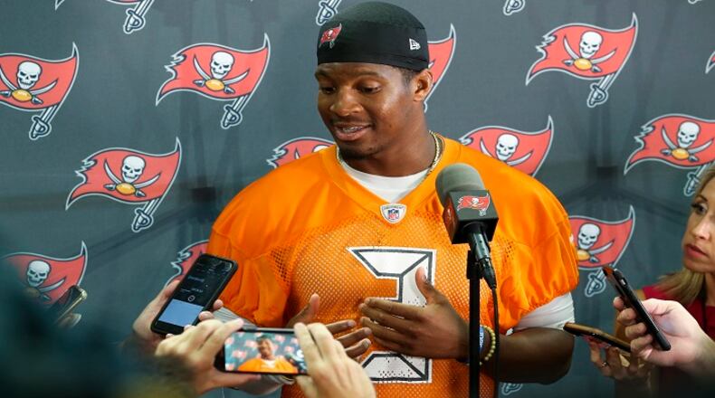 Tampa Bay Buccaneers quarterback Jameis Winston speaks with the media after the first day of training camp practice in Tampa, Fla., on Thursday, July 26, 2018. (Chris Urso/Tampa Bay Times/TNS)