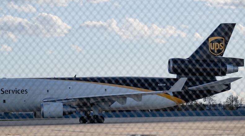 FILE - An MD-11F is seen parked at the UPS North Maintenance Hangar, Nov. 8, 2025, in Louisville, Ky. (AP Photo/Jon Cherry, File)