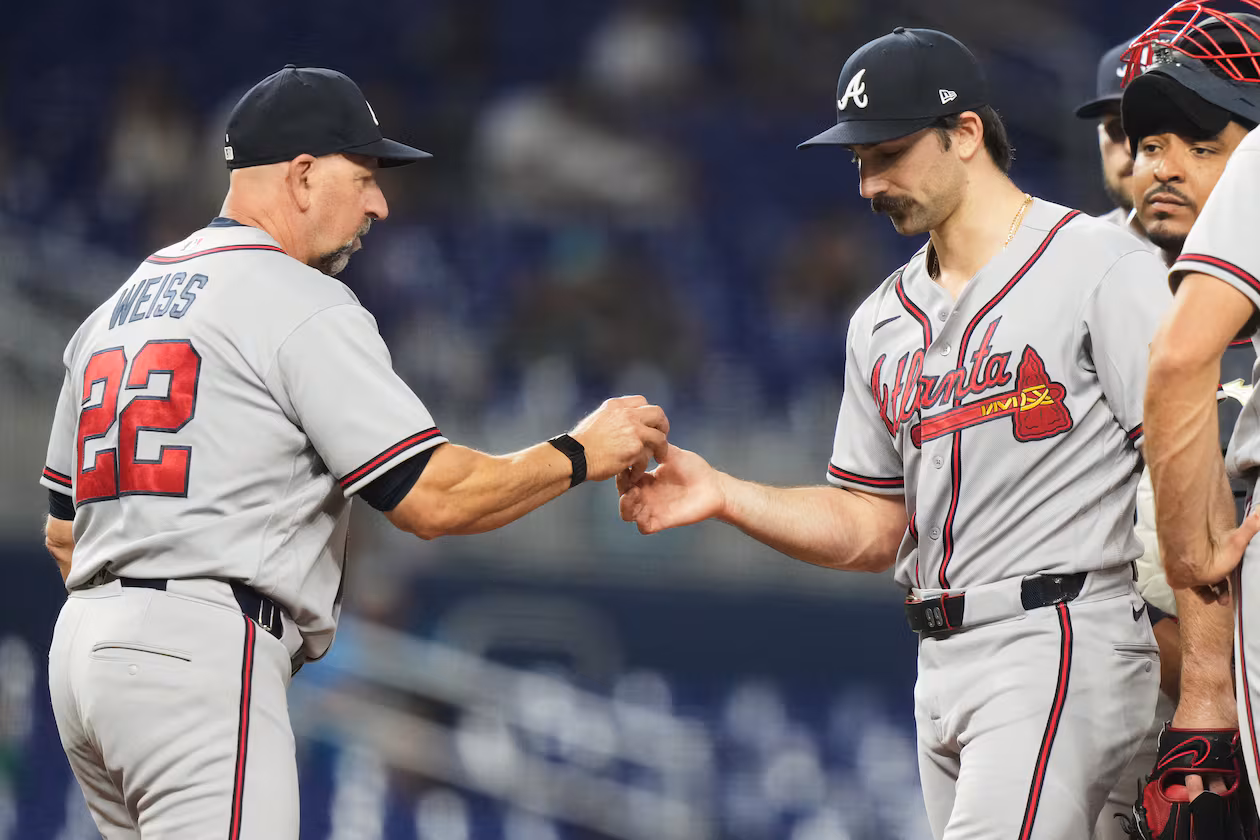 Atlanta Braves starting pitcher Spencer Strider, right, hands the ball to manager Walt Weiss (22) as he is relieved during the seventh inning of a baseball game against the Miami Marlins, Thursday, May 21, 2026, in Miami. (AP Photo/Lynne Sladky)