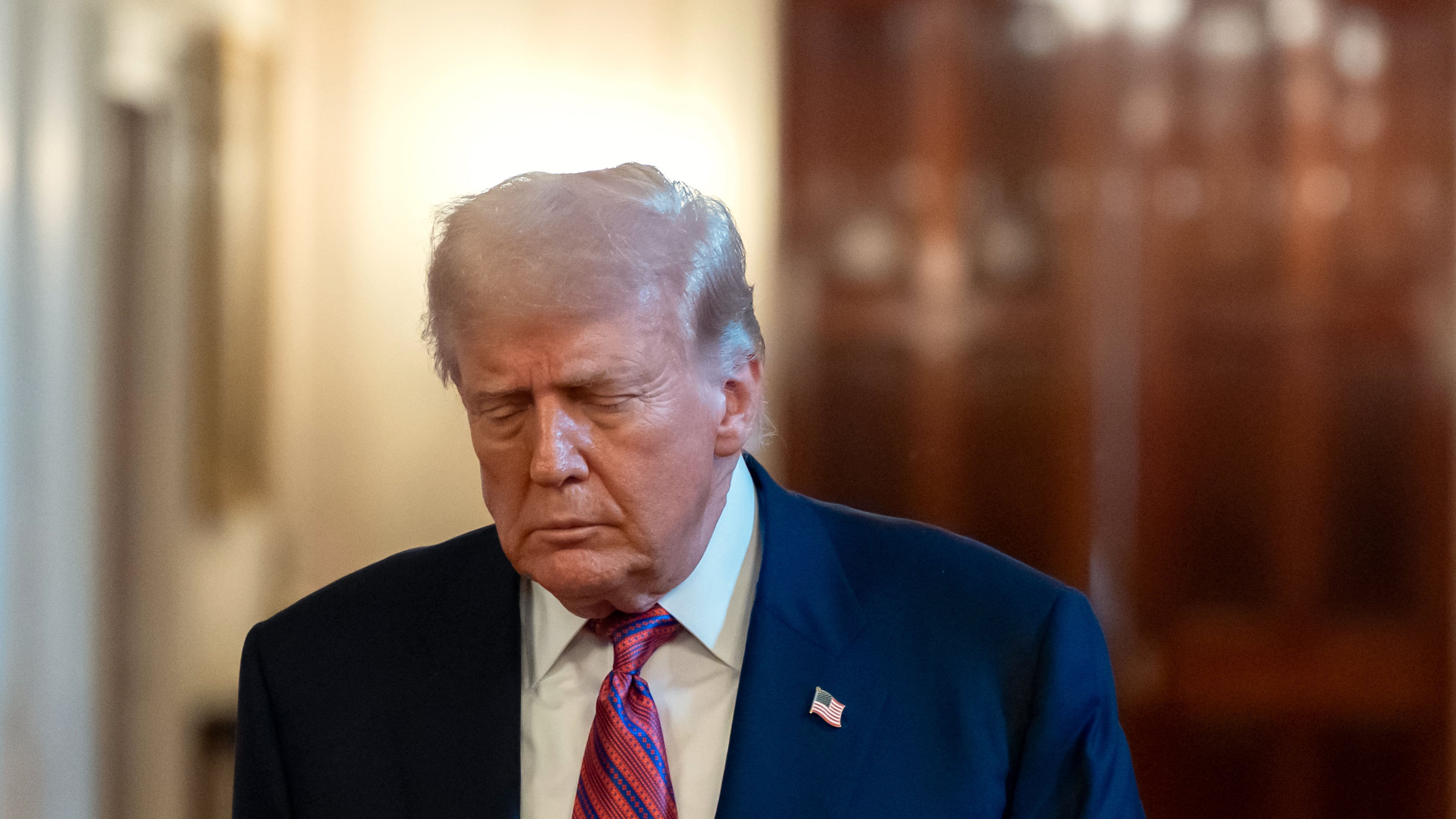 President Donald Trump arrives for an event to sign the GENIUS Act, a bill that regulates stablecoins, a type of cryptocurrency, in the East Room of the White House, Friday, July 18, 2025, in Washington. (AP Photo/Alex Brandon)