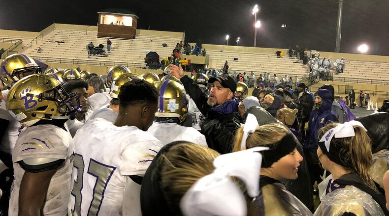 Former Bainbridge coach Jeff Littleton, now at Tift County, talks to players after a game.