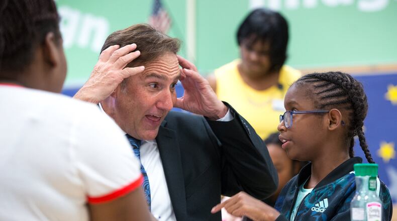 Fulton County Schools Superintendent Mike Looney’s mind is blown by Emily, 10, as he tours Evoline C. West Elementary School during its summer school program in Fairburn on Thursday, June 13, 2019. Looney’s first official day on the job is Monday, June 17. Starting Monday, June 17, Looney will lead Georgia’s fourth largest school district, which has a general fund budget of more than $1 billion. CASEY SYKES FOR THE ATLANTA JOURNAL-CONSTITUTION