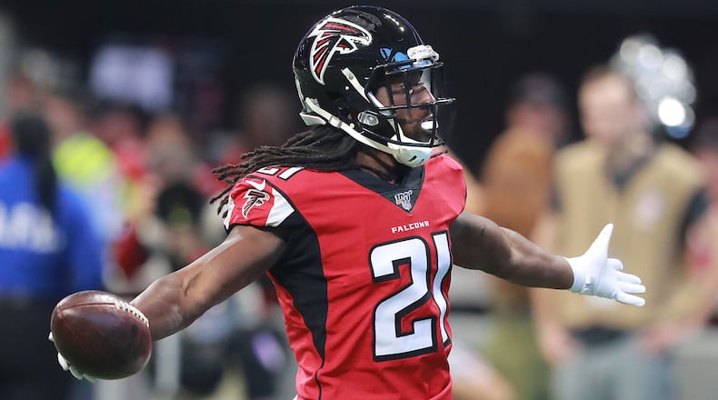 Falcons cornerback Desmond Trufant intercepts Buccaneers’ Jameis Winston during the first quarter Sunday, Nov. 24, 2019, at Mercedes-Benz Stadium in Atlanta.