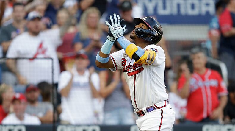 Braves outfielder Ronald Acuna celebrates after hitting a home run off St. Louis Cardinals pitcher Kwang Hyun Kim in the third inning of the second game of a doubleheader on Sunday, June 20, 2021, at Truist Park in Atlanta. (Ben Margot/AP)