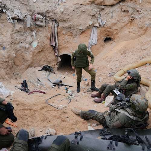 Israeli soldiers stand at the entrance of a tunnel where the army says the body of soldier Hadar Goldin was held in Rafah, Gaza Strip, Monday, Dec. 8, 2025. Hamas returned his remains to Israel as part of the current ceasefire. (AP Photo/Sam Mednick)