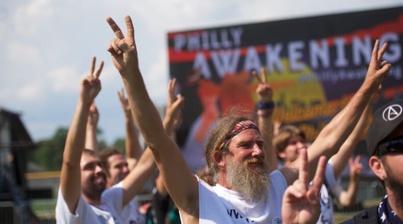 Bernie Sanders supporters gather for Philly Awakening, an event they described as a "political Woodstock", two days before the start of the Democratic National Convention in Philadelphia, July 23, 2016. Hillary Clinton campaigned alongside her running mate on Saturday, introducing Sen. Tim Kaine as a progressive who likes to get things done. (Mark Makela/The New York Times)