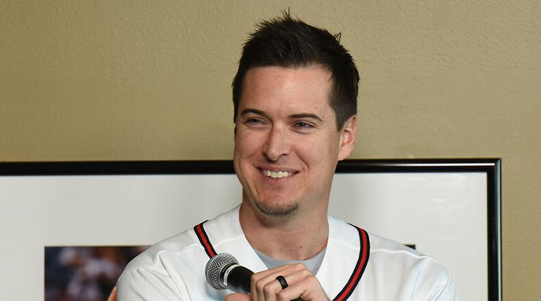 Roughly six months after being traded away by Atlanta, Kelly Johnson was back at Turner Field on Saturday talking to fans.
