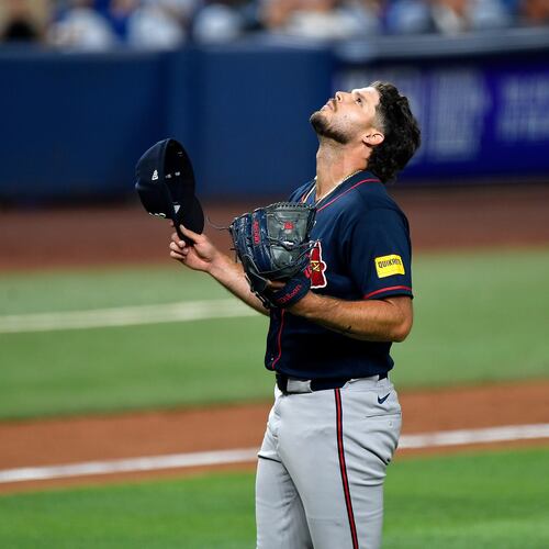 Atlanta Braves pitcher Victor Mederos reacts after beating the Miami Marlins, Wednesday, May 20, 2026, in Miami. (AP Photo/Michael Laughlin)