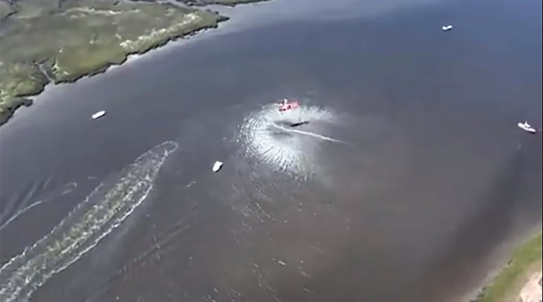 The Coast Guard conducts a rescue at the scene of a deadly boat crash on Memorial Day weekend 2022. Four members of the Leffler family were killed in a boating crash. Parents, Lori and Chris Leffler, along with sons Zach and Nate died. Daughter Kate survived. (U.S. Coast Guard video screenshot)